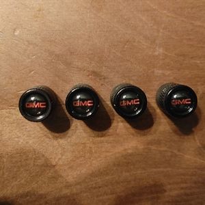 4 GMC Black Tire Stem Covers